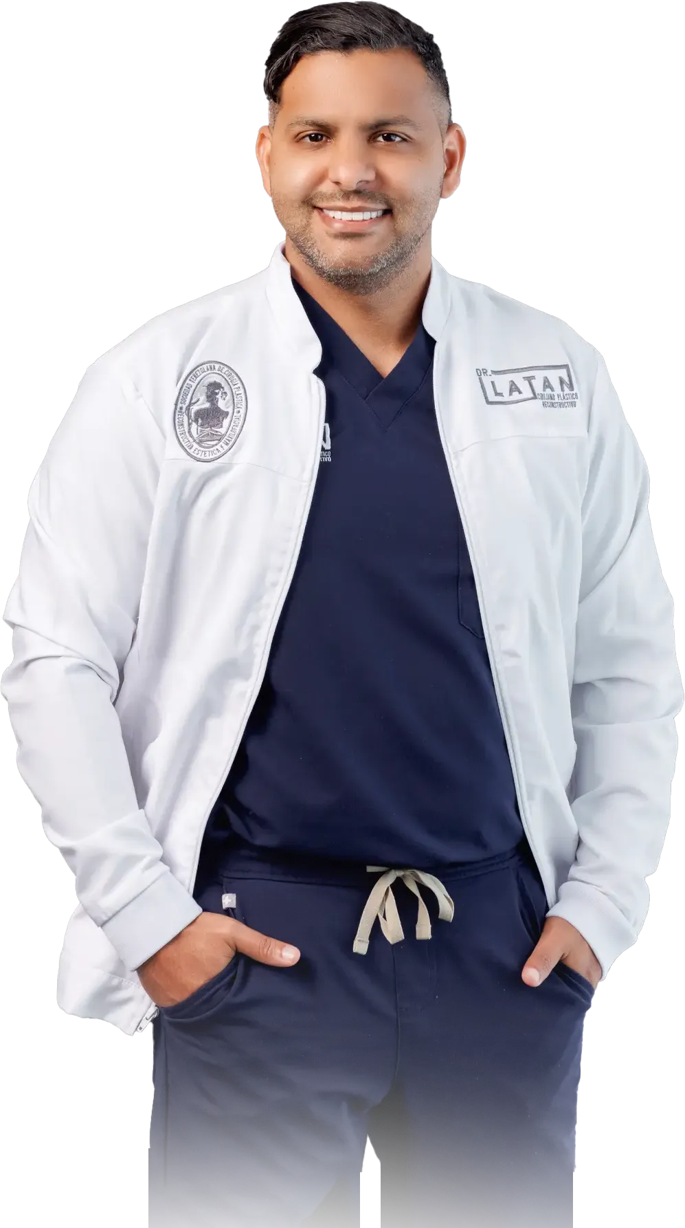 Dr. José Manuel Latan con bata blanca